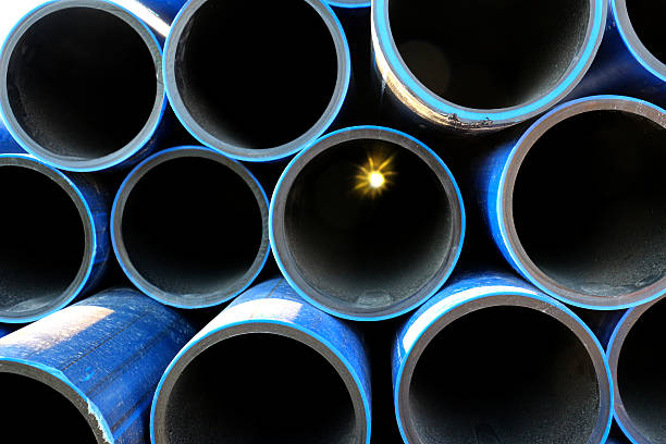 istock pile of blue pvc pipe 534564914