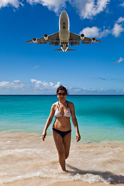 istock Woman on vacation at Saint Martin beach 534565358