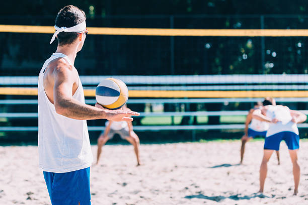 istock Beach volleyball game serve 534567170