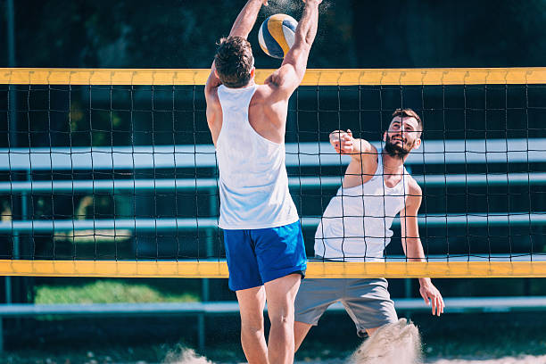 istock Beach volleyball action on the net 534568592
