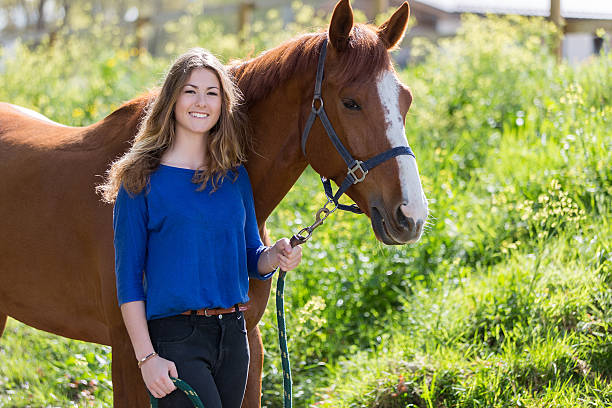 istock pretty girl with her horse 534569626