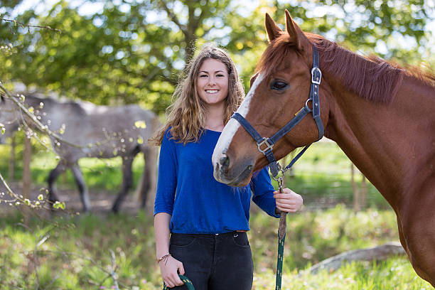 istock pretty girl with her horse 534570074