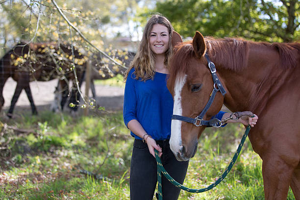 istock pretty girl with her horse 534570234