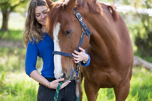 istock pretty girl with her horse 534570412
