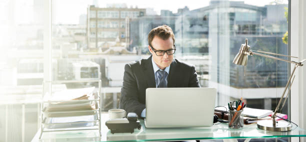 istock Businessman working on laptop in office 534574099