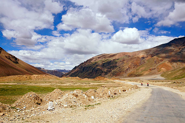 istock Two Motorcyclists on the Mountain Road 534599237