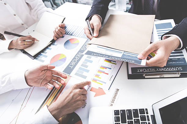 istock Business adviser analyzing financial figures denoting the progre 534599562