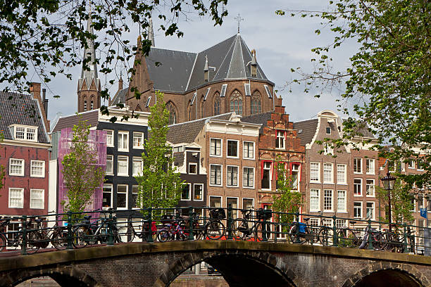 istock Amsterdam city. View with bridge and typical dutch houses 534601383