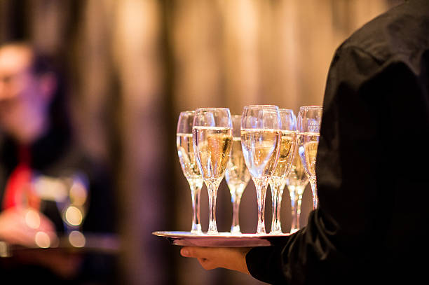 Champagne Reception Wedding reception drinks served by a waiter serving food and drinks stock pictures, royalty-free photos & images