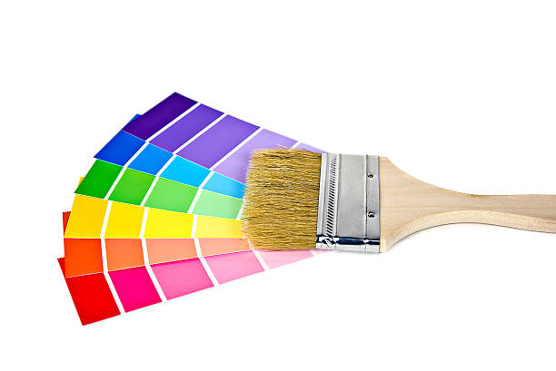 istock paint brush on bright color paint chips 534607403