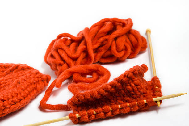 istock Yarn and knitting needles isolated on white background. 534607896