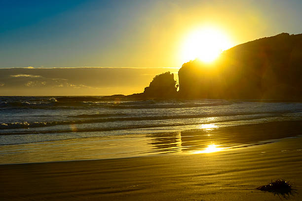 istock Beautiful golden sunset over a beach, QLD, Australia 534608509