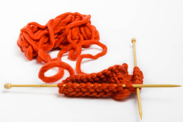 istock Yarn and knitting needles isolated on white background. 534608576