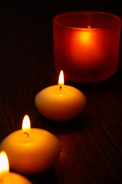 istock Glass candlestick and candles on wooden table 534611001