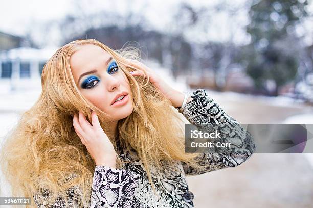 Golden Haired Woman Posing Outside Stock Photo - Download Image Now - 2015, Adult, Arts Culture and Entertainment