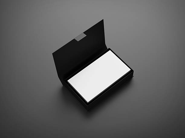 istock White business cards in the box on gray background 534635979