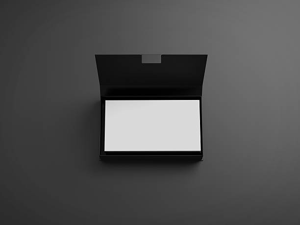 istock White business cards in the black box 534635983