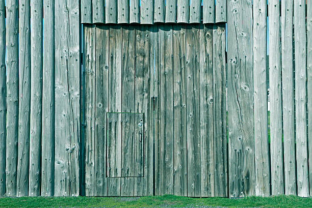 istock Gate and door in log wall of old fort 534636151