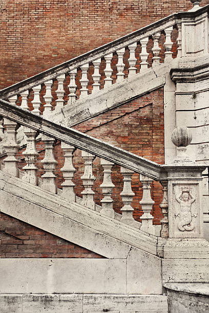istock Staircase with a balustrade in old house, Rome, Italy 534637405