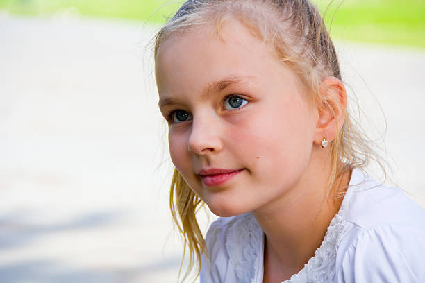 istock Cute girl with big blue eyes 534638961