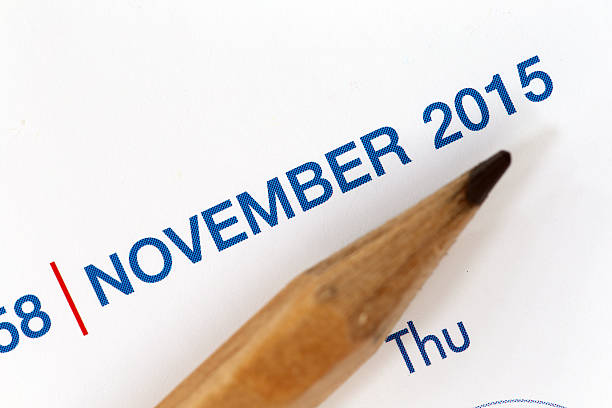 istock The tip of a pencil point to year blur Text. 534639143