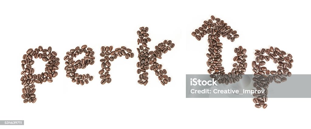 Perk Up Text in Coffee Beans Coffee beans on white background spelling out 'perk up' Coffee - Drink Stock Photo