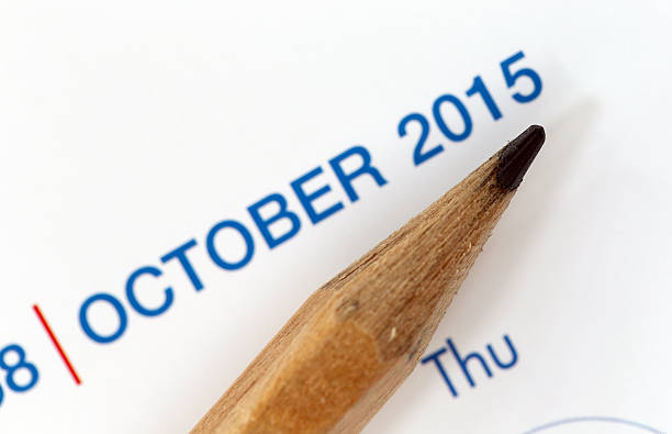 istock The tip of a pencil point to year blur Text. 534639849