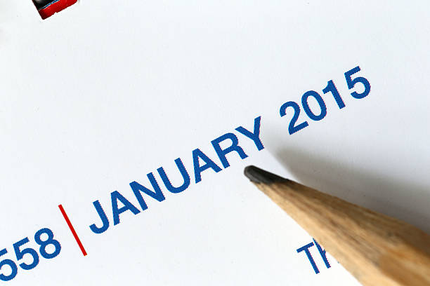 istock The tip of a pencil point to the year text. 534640421