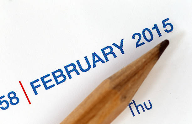 istock The tip of a pencil point to the year text. 534640423