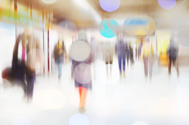 istock white blurry businnes background and people 534640511