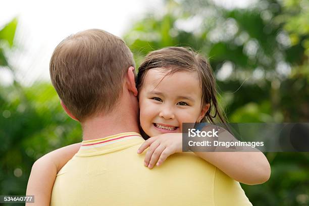 Carrying Daughter Stock Photo - Download Image Now - 2015, Adoption, Adult