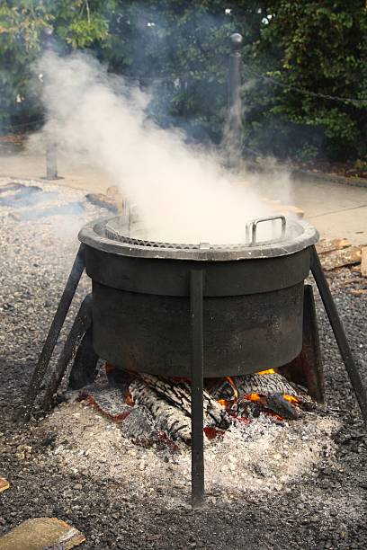 istock Large Cauldron Cooking Fish At A Fish Boil 534640803