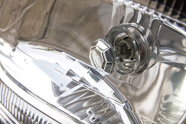 istock closeup of headlight of car. 534642199