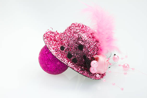 istock pink ball and hat christmas on white background 534642363