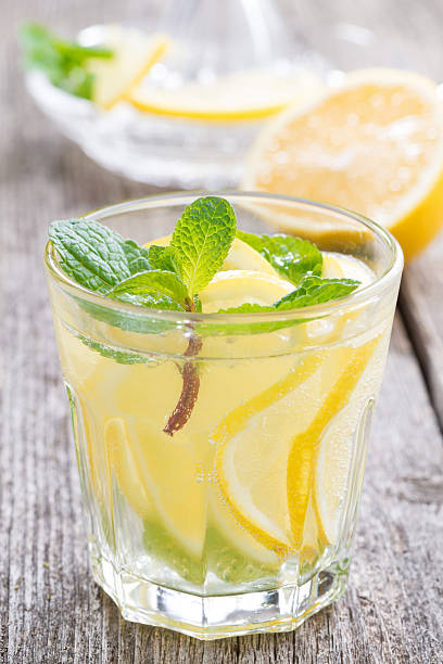 istock refreshing mint lemonade on a wooden table, close-up 534642381