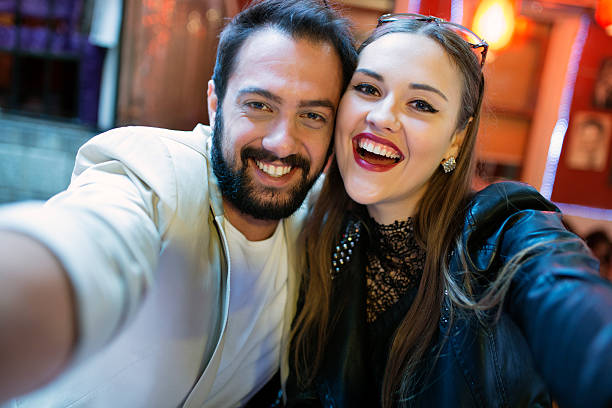istock young Couple  Having Fun with Smartphone Photography 534642975