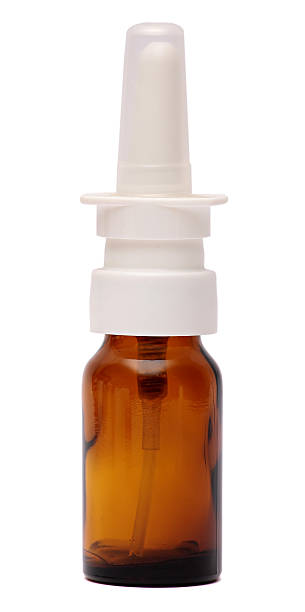 istock Bottles with spray nasal drops isolated on white background . Medicine 534643523