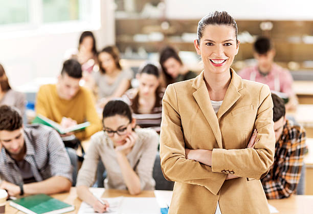 istock Happy teacher in the classroom. 534644049