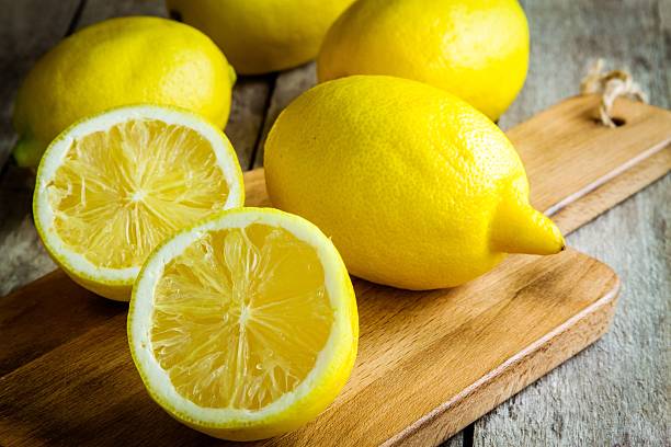 istock Fresh juicy lemons on a cutting board 534644289