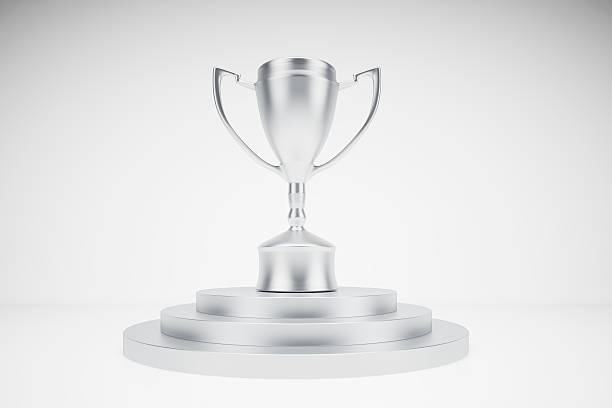 istock silver trophy on podium with isolated background 534662537