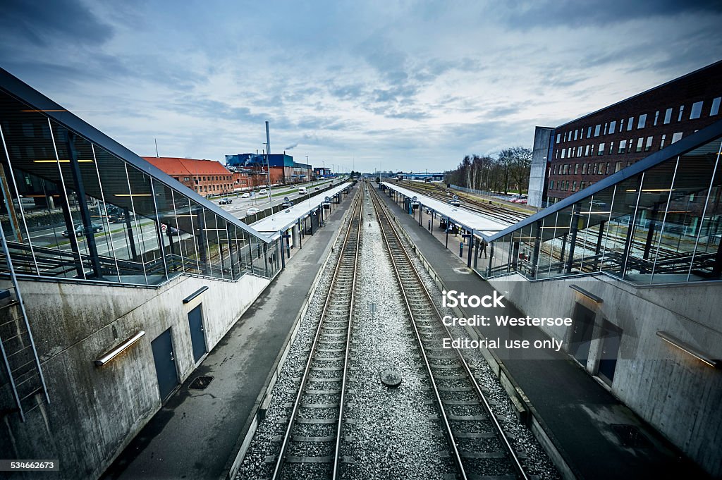 Herning Station Herning, Denmark - January 19, 2015: Danish local train station in Jutland. Some people are waiting for the next train. 2015 Stock Photo