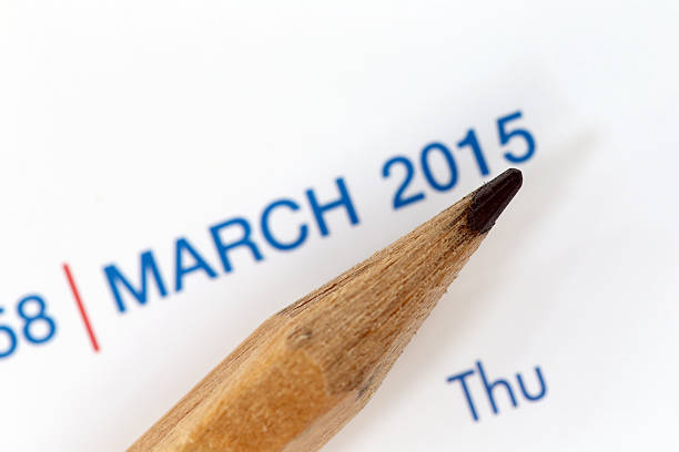 istock The tip of a pencil point to year blur Text. 534662995
