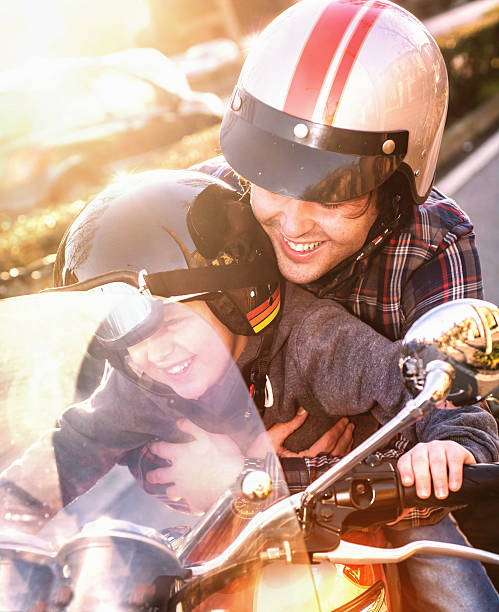 istock Happy Father and Son Riding a Motorcycle 534664967