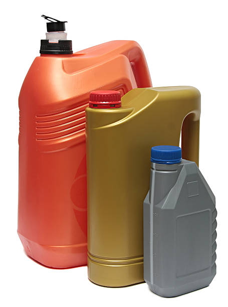 istock Plastic bottles from automobile oils isolated on white background 534666281