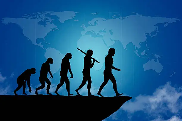 Human evolution on the cliff with blue, map of earth, background. Human evolution of man / people, from monkey to modern man, going towards the end of the cliff. Ending an era or it can be as risk to end a business project / company. Behind is the map of the world with clouds.