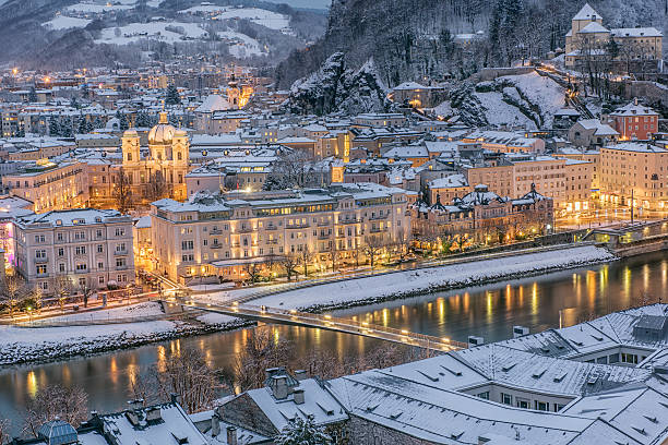 Salzburg Austria covered in Snow at Night Salzburg Austria covered in Snow at Night Kapuzinerberg stock pictures, royalty-free photos & images