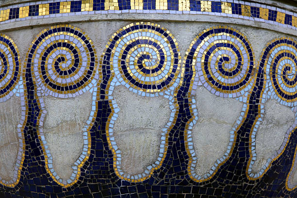 Vienna, Austria - June 14, 2014: Mosaic tiles on an urn that is part of the Secession Building, an exhibition hall built in 1897 by Joseph Maria Olbrich in Vienna.