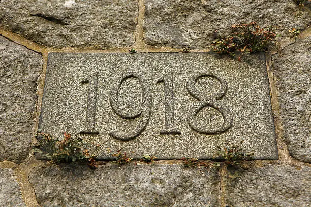 Photo of Year 1918 of World War I carved in stone.