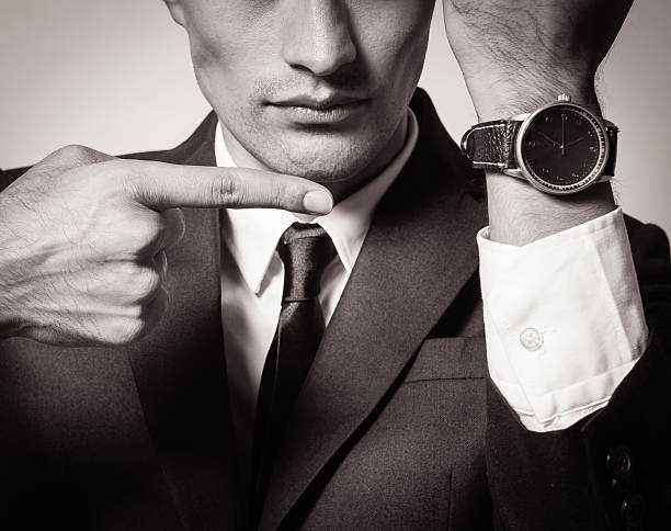 istock Man showing time on his wrist watch 534668859