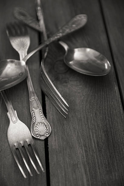 istock Vintage cutlery on rustic wooden table background 534670243